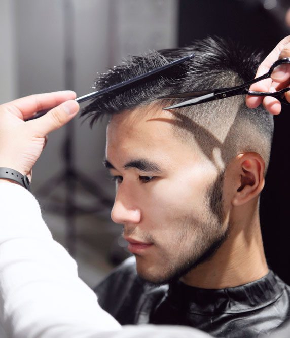man getting a hair cut